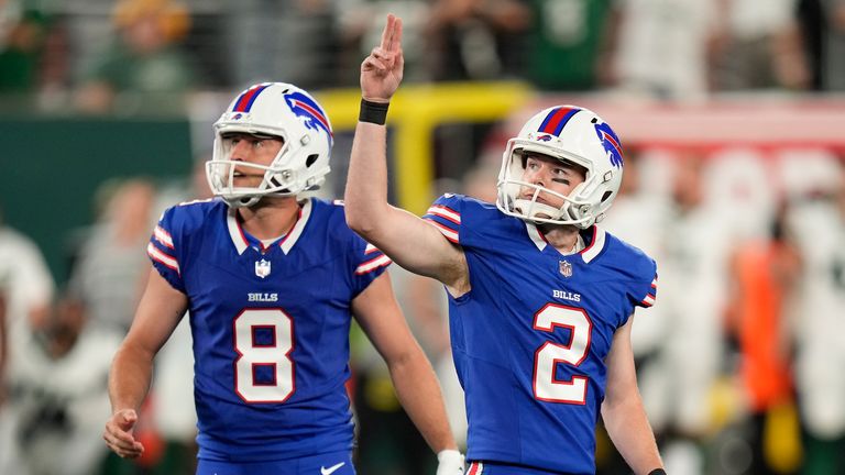 Buffalo Bills place kicker Tyler Bass (2) and punter Sam Martin (8) react as they watch Bass&#39; 50-yard field goal bounce off and through the uprights to tie the score against the New York Jets during the fourth quarter of an NFL football game, Monday, Sept. 11, 2023, in East Rutherford, N.J.
