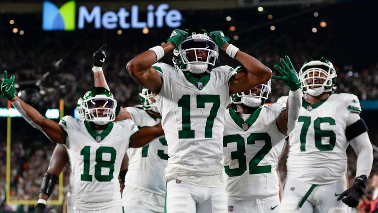 New York Jets wide receiver Garrett Wilson (17) celebrates with teammates after catching a pass for a touchdown against the Buffalo Bills during the fourth quarter of an NFL football game, Monday, Sept. 11, 2023, in East Rutherford, N.J.